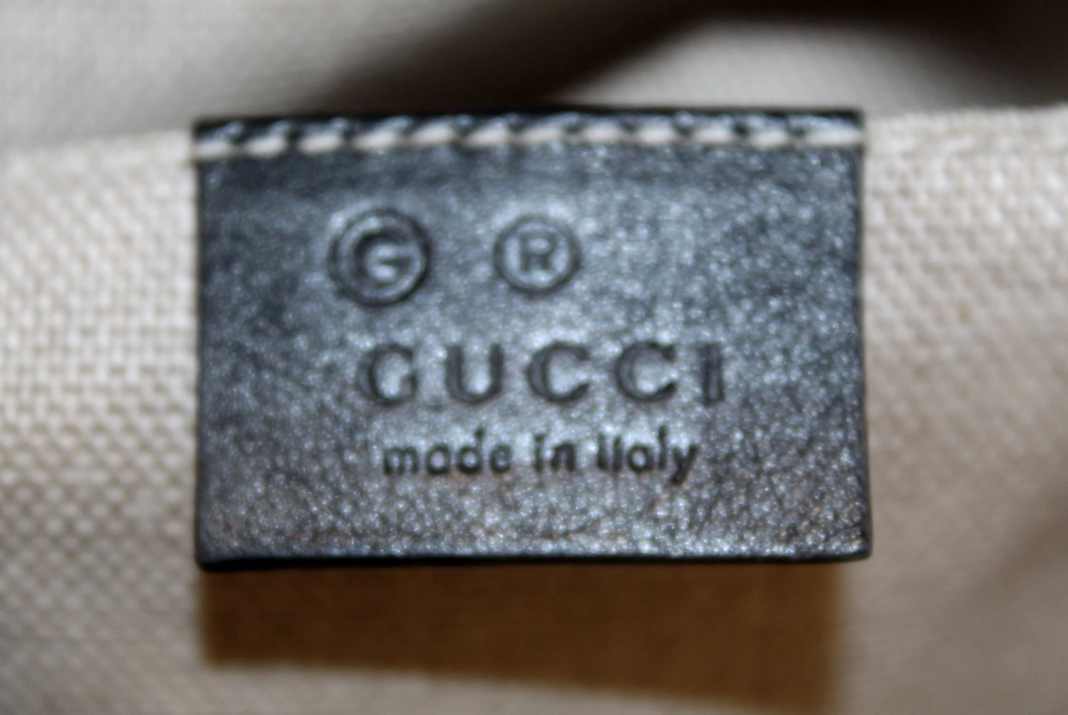 Authentic Black Gucci GG MicroGuccissima Leather Bree Crossbody Bag