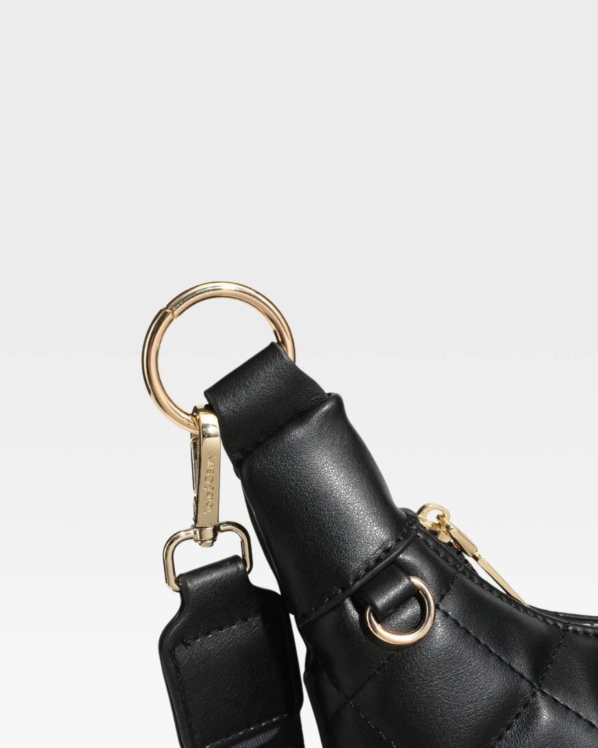 Diamond Stitch Crescent Messenger Bag in Black