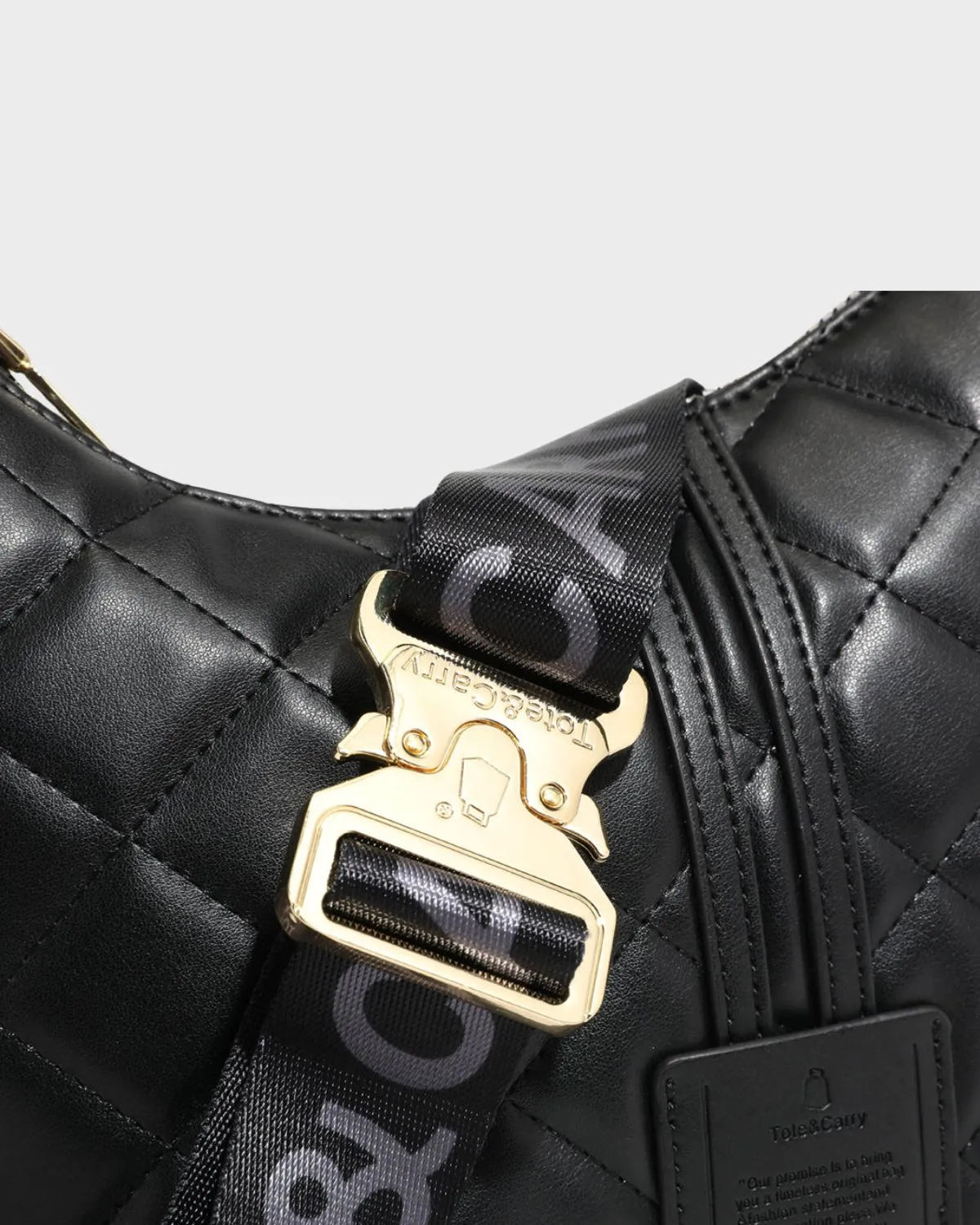 Diamond Stitch Crescent Messenger Bag in Black