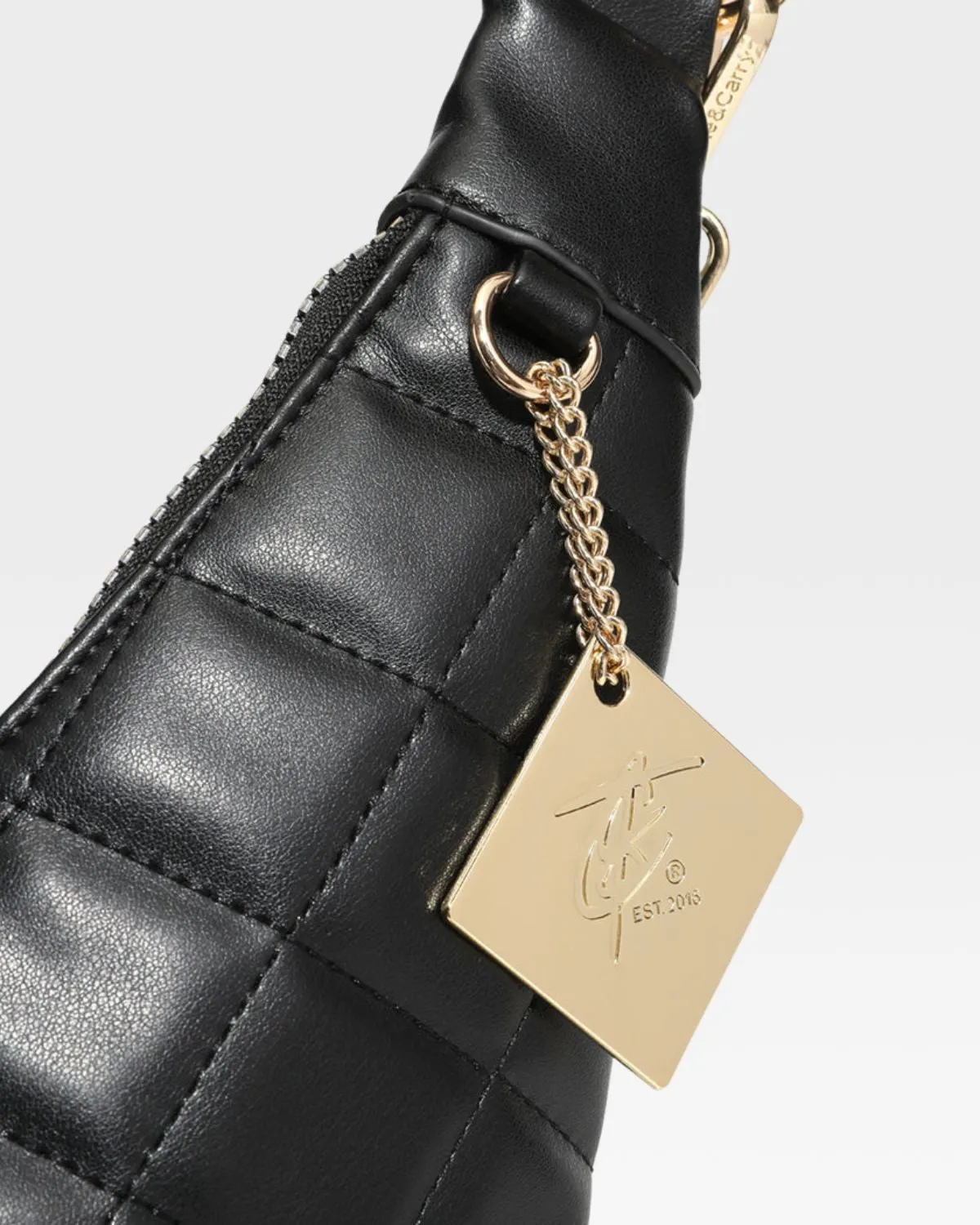 Diamond Stitch Crescent Messenger Bag in Black