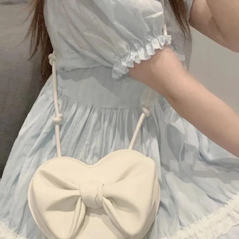 UAKISS  -  Cute White Heart Shoulder Lolita Bag Female Harajuku Kawaii Small Bowknot Crossbody Bags For Women Cell Phone Purse Womens Pouch